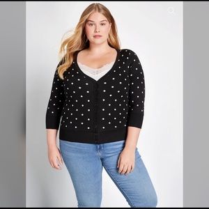 ModCloth black cardigan sweater with white polka dots.   Size 4